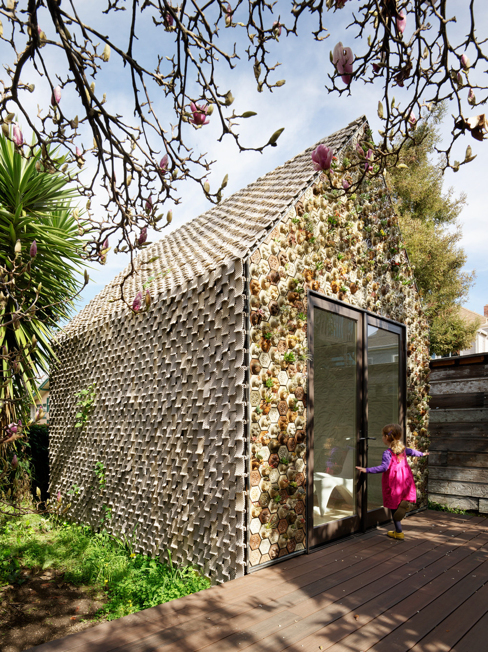 4,500 3D printed ceramic shingles clad the walls and roof of the cabin. Photo: Matthew Millman